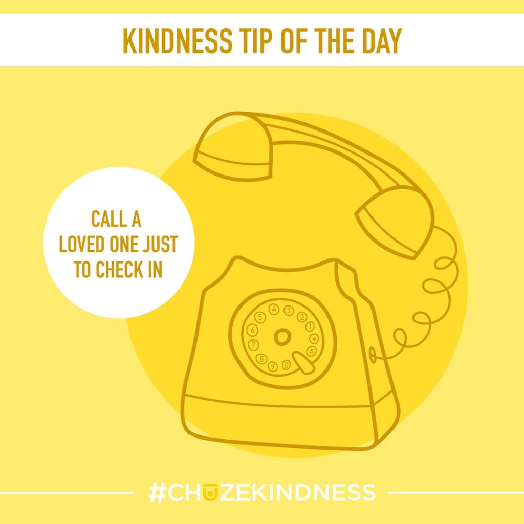 Yellow Kindness tip of the day graphic with a rotary phone that says "Call a loved one just to say hello."