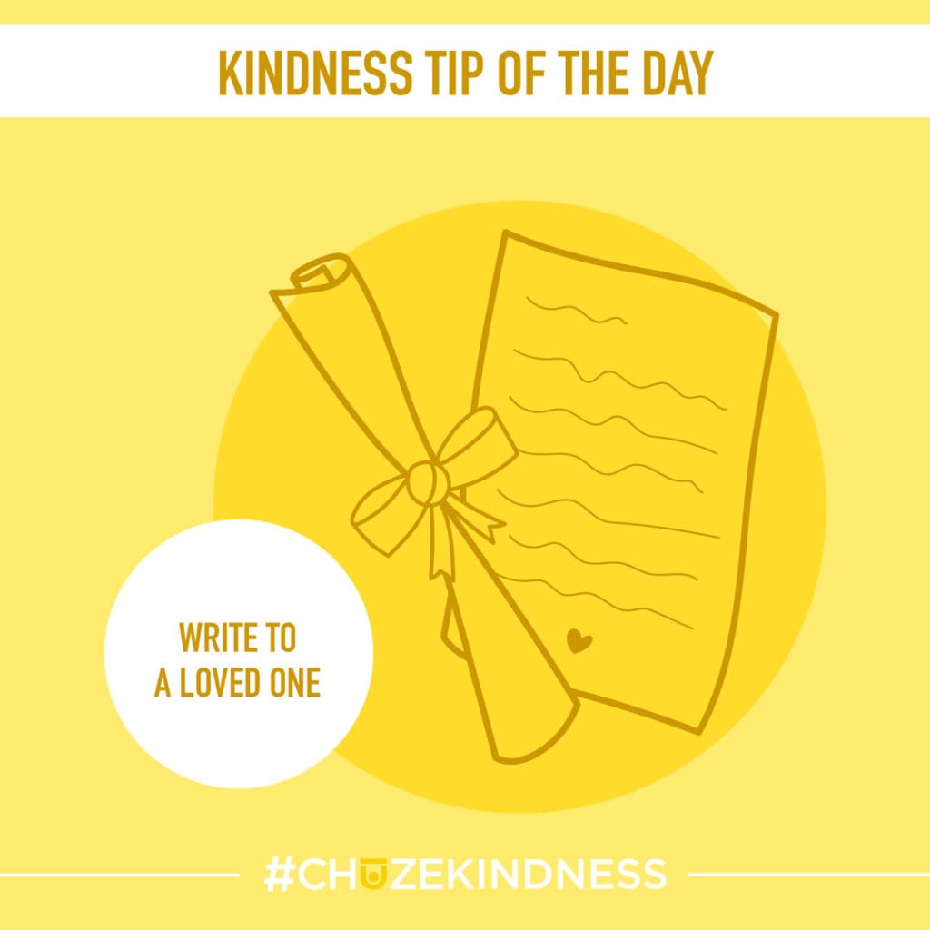 Yellow Kindness Tip Of The Day graphic with a piece of paper and writing on it that says, "Write to a loved one."